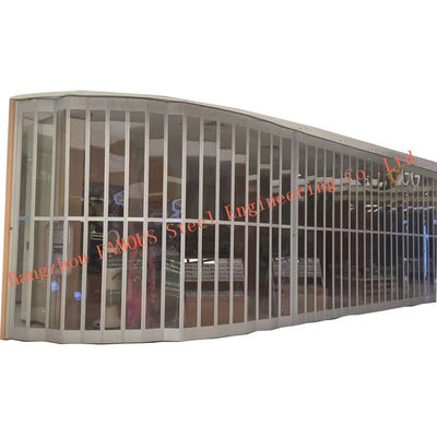 Chine Pliage transparent d'accordéon de lamelle de PC en aluminium commercial de polycarbonate glissant des portes de rouleau de volet de sécurité fournisseur