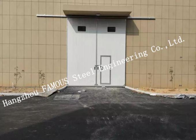 Portes industrielles coulissantes horizontales sectionnelles de garage avec la porte piétonnière d'Access pour l'atelier 0
